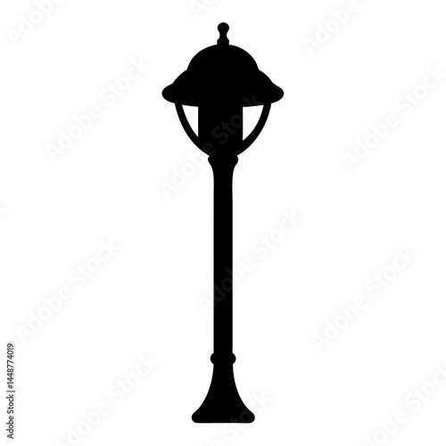 Silhouette of an outdoor streetlight with a decorative top and base