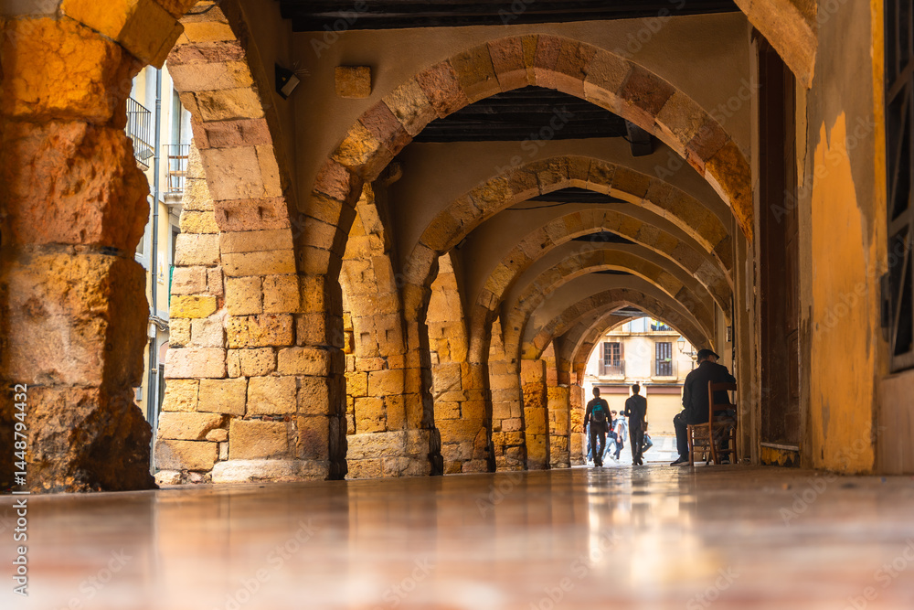 Exploring the medieval arches of tarragona, spain