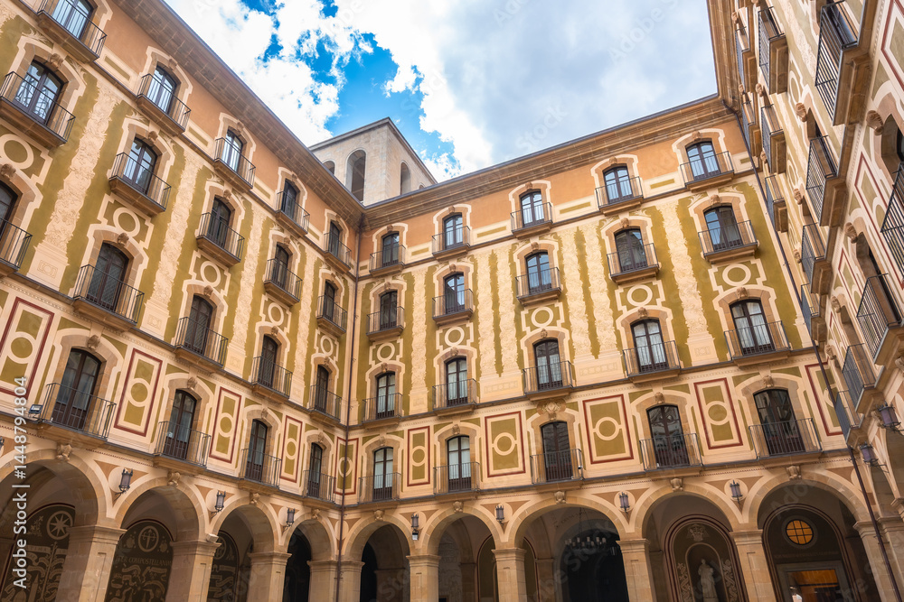 Montserrat monastery courtyard showing arched walls and balconies