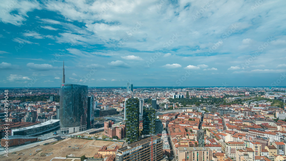 Obraz premium Milan aerial view of modern towers and skyscrapers and the Garibaldi railway station in the business district timelapse