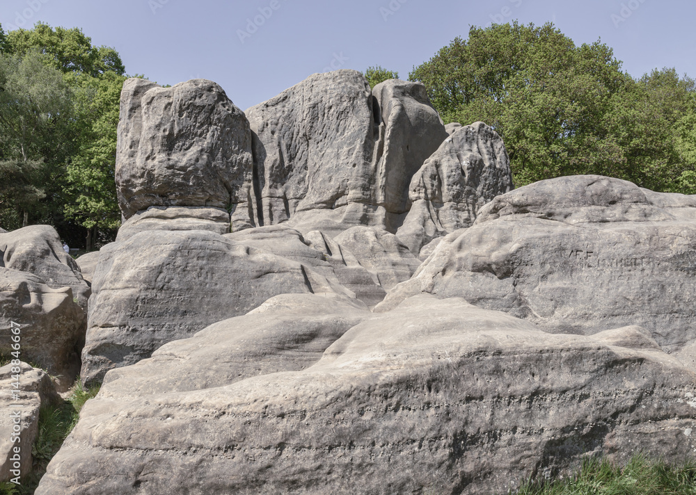Scenery view of An unusual outcrop of natural sandstone rocks on Wellington Rocks at Tunbridge Wells Common. use it as your Wallpaper, Poster and Space for text, Selective focus.