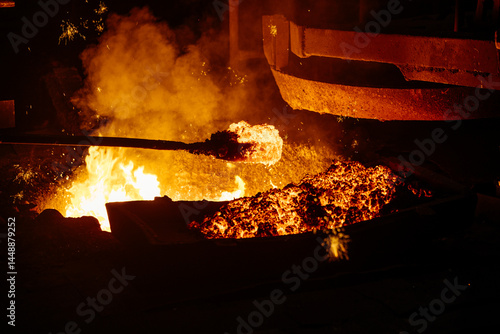 Photos Removing slag from surface of hot iron in melting furnace