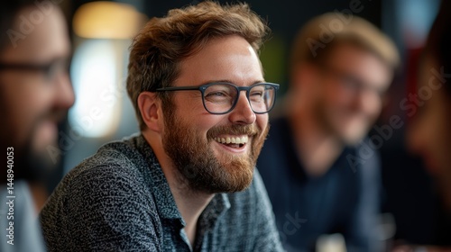 Colleagues laughing during a break