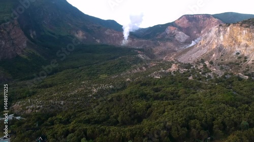 volcano crater aerial drone view on sunset time