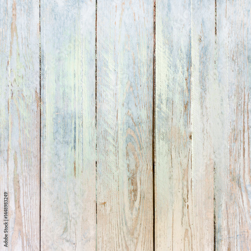 Schilderij op canvas Light pastel weathered wooden plank texture with faded blue and beige tones, soft grain, and subtle distress
