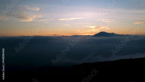 A serene mountain landscape on a summer evening. Beautiful panorama from the top of the mountain