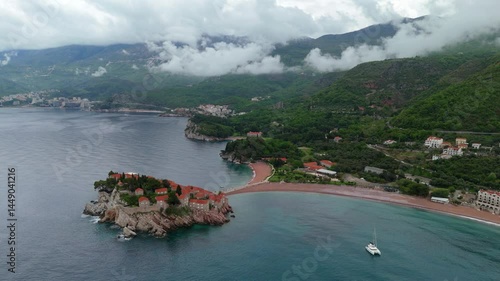 Aerial drone view Sveti Stefan Budva Kotor Montenegro Adriatic Sea Mediterranean Medieval town blue sea water Vacation Holiday Europe 