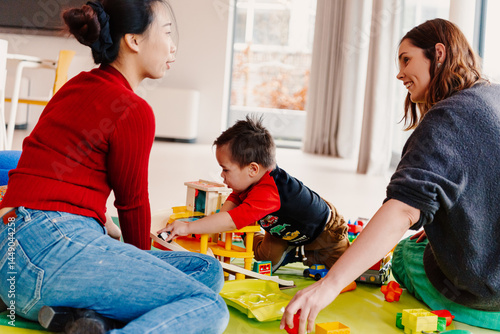 Mother and educator interact at childcare center