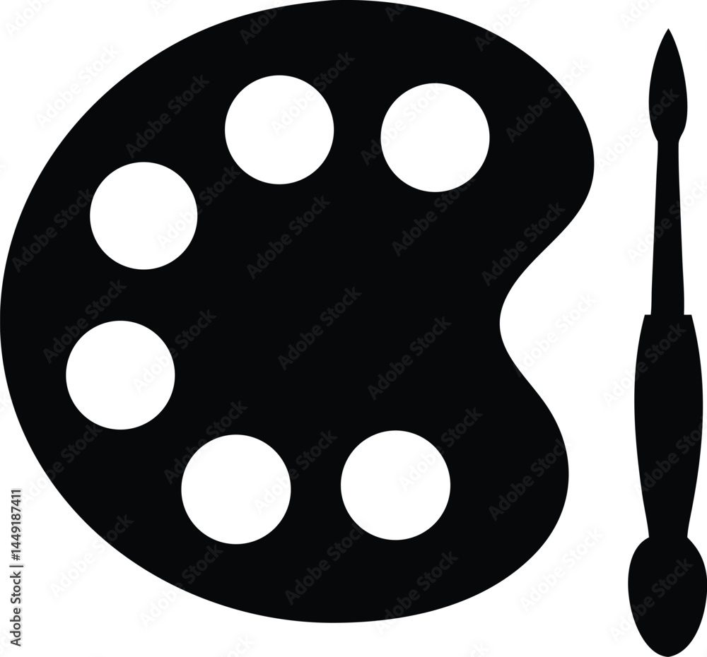 Fototapeta premium A black paint palette with six wells sits beside a matching brush