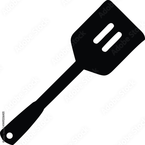 Isolated black spatula with three slots displayed prominently against white background, cooking utensil