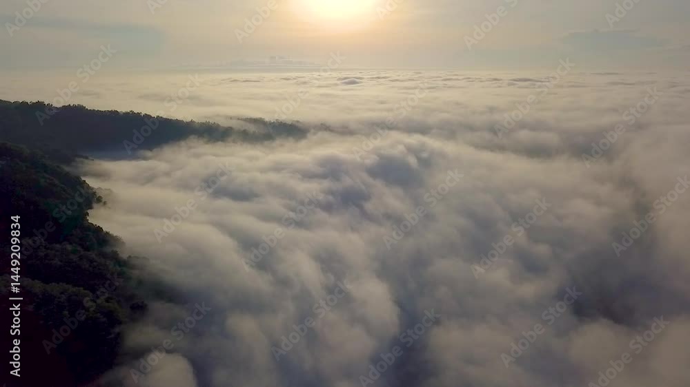 Fly above the clouds in sunrise moment Fly above the clouds in sunrise moment