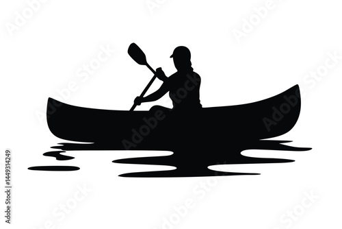 Silhouette of a person kayaking on a river or lake