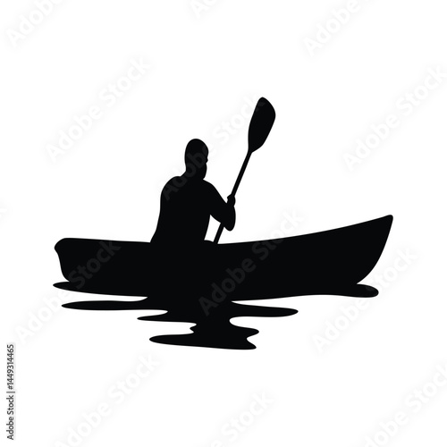 Silhouette of a person kayaking on a river or lake