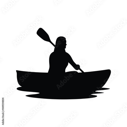 Silhouette of a person kayaking on a river or lake