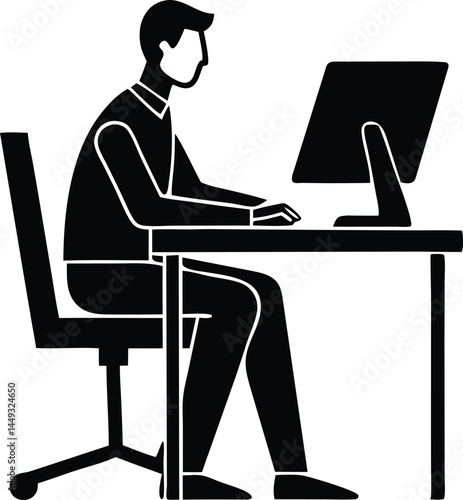 man working at computer setting in a desk silhouette.