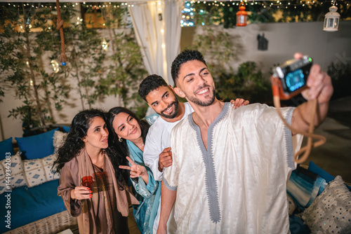 Wallpaper Mural Young muslim friends taking a group photo Torontodigital.ca