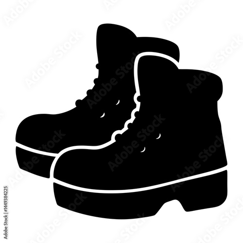 Pair of high top boots in silhouette for outdoor activities and adventures