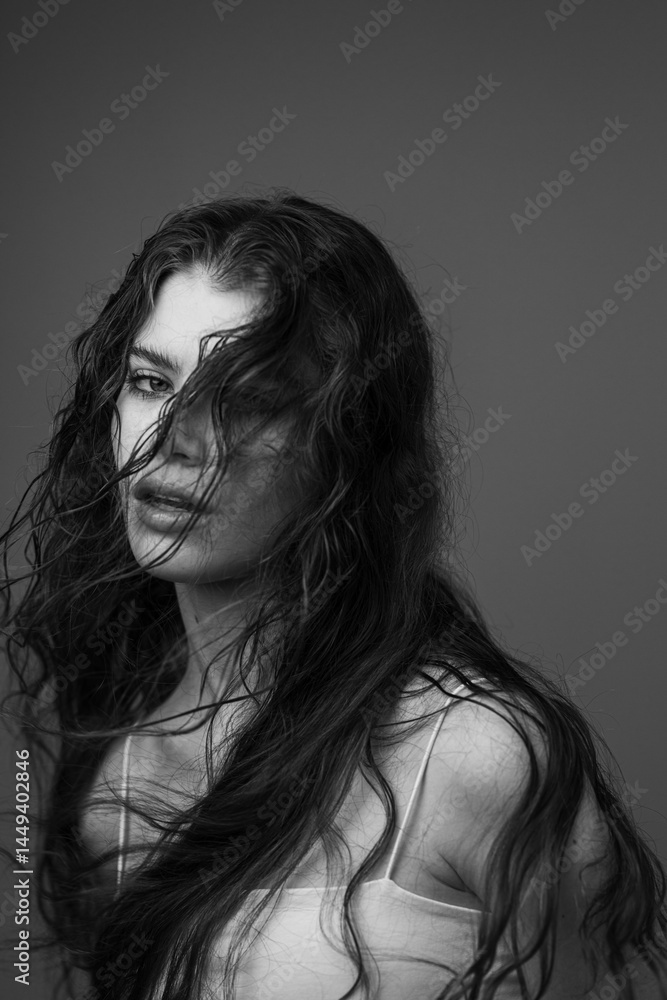 Expressive bw portrait of a model posing in studio Expressive bw portrait of a model posing in studio