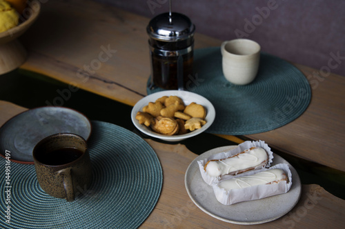 Delicious pastries and coffee on a rustic table