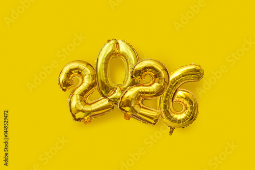 Gold 2026 Balloon Numbers on Yellow Background