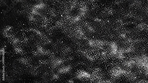 Abstract black and white pixelated fabric texture with grainy halftone pattern, resembling risograph print and layered fibers. Perfect for graphic design, printmaking, and monochrome backgrounds.