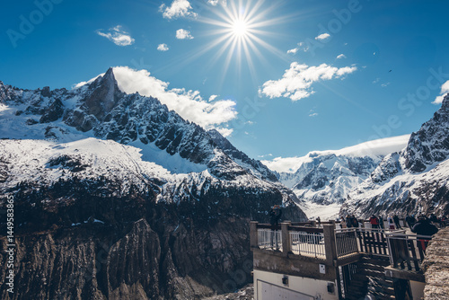 Discover the scenic viewpoint and panoramic views of the Montenvers Mer de Glace and Mont Blanc mountains, and the red train in Chamonix, Haute-Savoie, France.