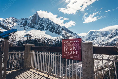 Discover the scenic viewpoint and panoramic views of the Montenvers Mer de Glace and Mont Blanc mountains, and the red train in Chamonix, Haute-Savoie, France.