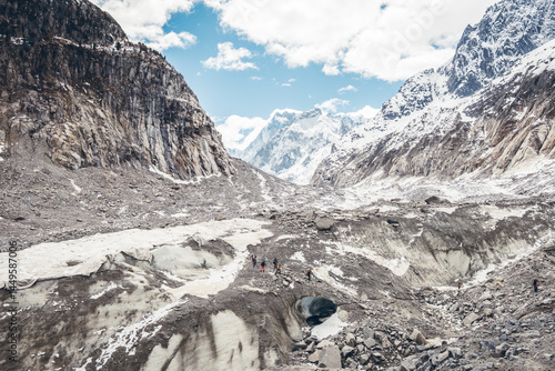 Discover the scenic viewpoint and panoramic views of the Montenvers Mer de Glace and Mont Blanc mountains, and the red train in Chamonix, Haute-Savoie, France.