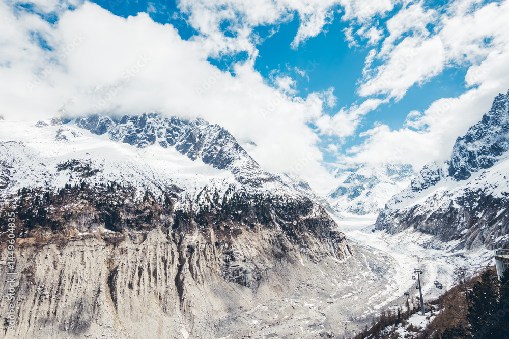 Obraz premium Discover the scenic viewpoint and panoramic views of the Montenvers Mer de Glace and Mont Blanc mountains, and the red train in Chamonix, Haute-Savoie, France.