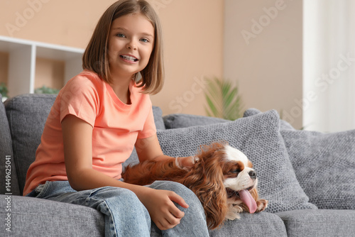 Happy little girl with cute...