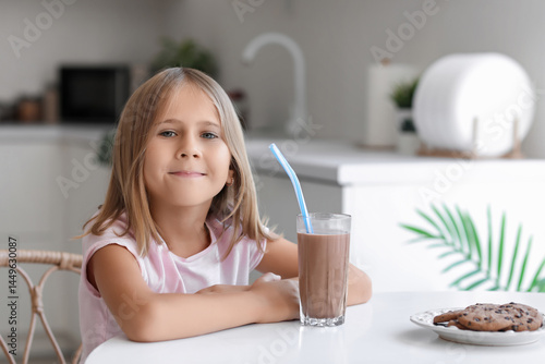Smiling little girl with ch...