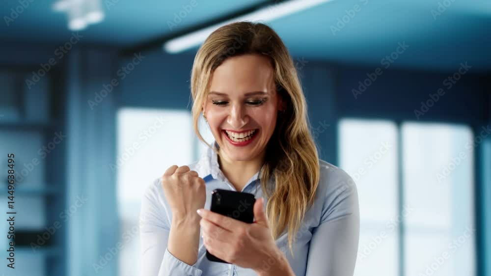 Young Woman On Blue Background With Phone Young Woman On Blue Background With Phone