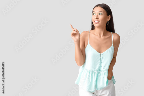 Beautiful young Asian woman...