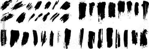 Dynamic Brushstrokes: A captivating collection of bold, textured black brushstrokes on a clean backdrop, perfect for adding artistic flair and graphic appeal to any project.