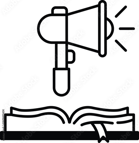 book with a microphone on top of it