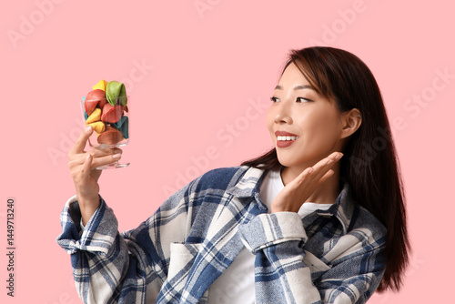 Young Asian woman with colo...