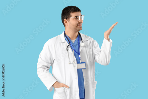 Male doctor showing somethi...
