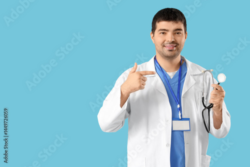 Male doctor pointing at ste...