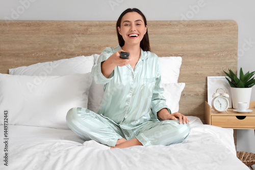 Young woman in green pajama...