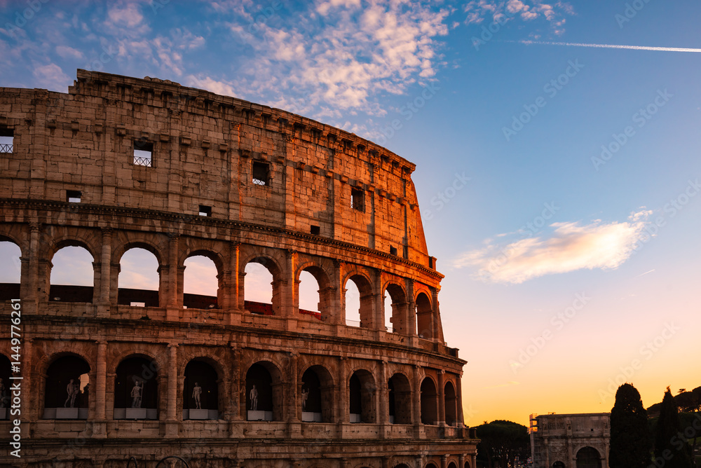 Fototapeta premium Colosseum on sunset, famous landmark in Rome, Italy