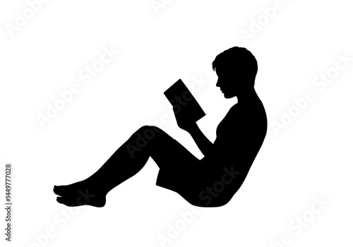 Silhouette of a Person Relaxing and Reading a Book