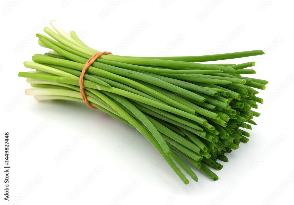 A bundle of fresh chives tied together with a rubber band is isolated on a white background A bundle of fresh chives tied together with a rubber band is isolated on a white background