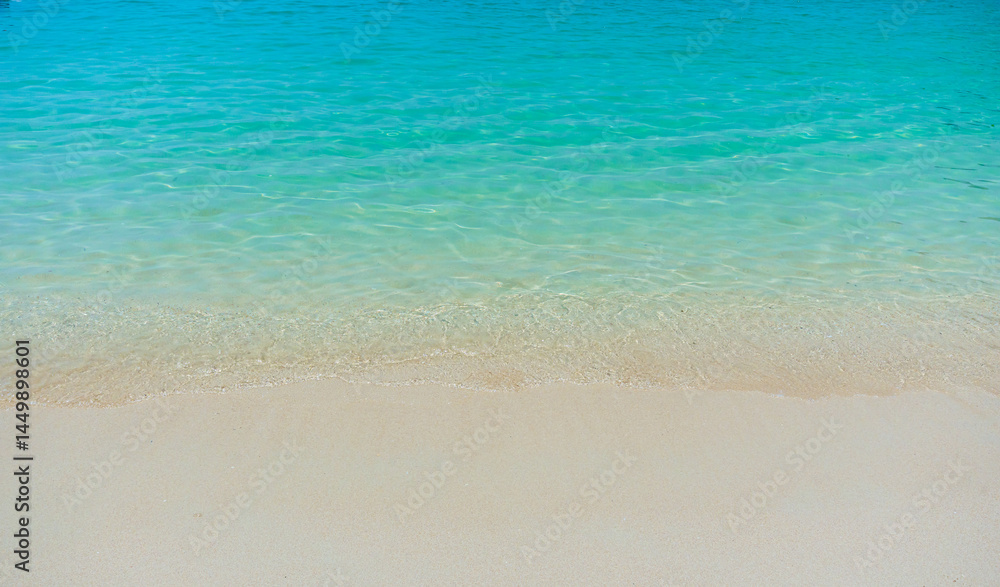 top view of soft wave of the sea on the sandy beach top view of soft wave of the sea on the sandy beach