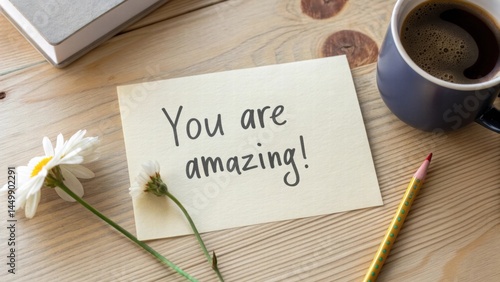Compliment Note with Coffee and Flower on Wooden Table  