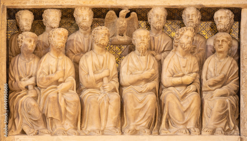PISTOIA, ITALY - MARCH 16, 2025: The marble relief of Twelve apostle on the medieval pulpit in the church Chiesa di San Giovanni Fuorcivitas by Guglielmo da Pisa (1270).