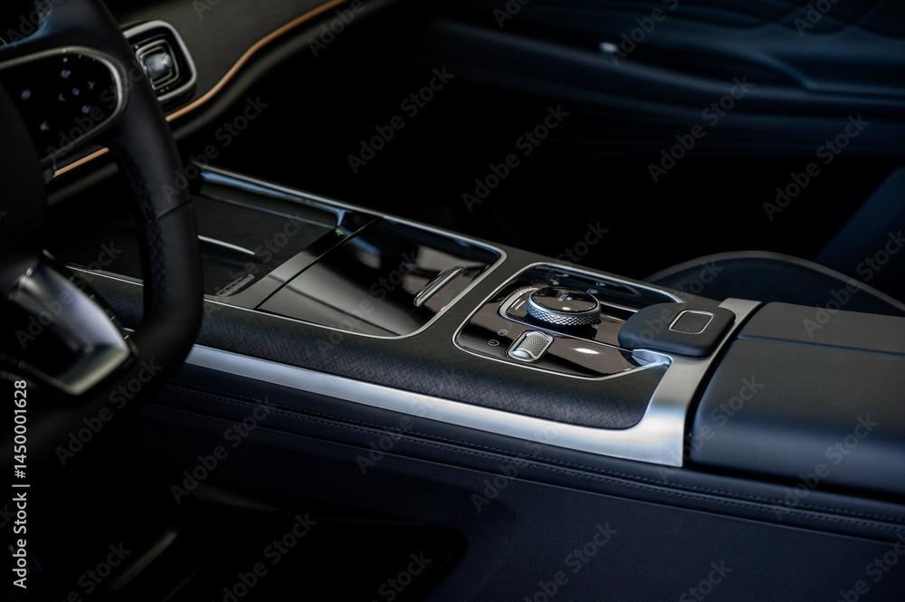 Automatic transmission selector in the interior of a modern car. Automatic transmission selector in the interior of a modern car.