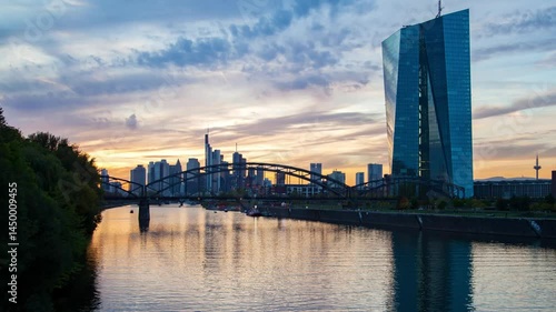 Mesmerizing timelapse of sunset reflections on the river in Frankfurt