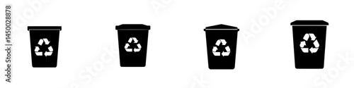 Various recycling bins designed for waste separation in an urban setting during daylight hours