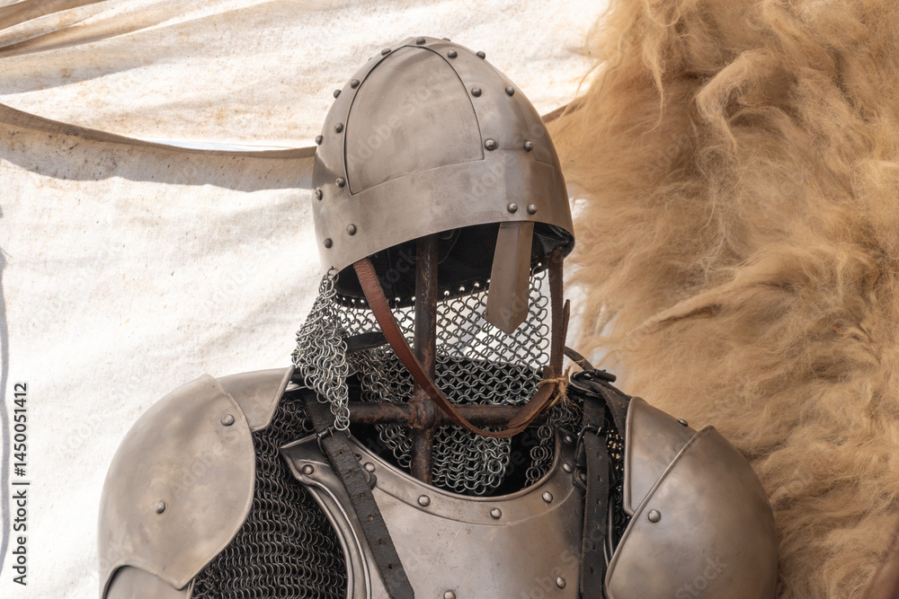 Medieval armor display with helmet and chainmail Medieval armor display with helmet and chainmail