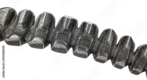Close-up of a metallic gear chain on white background